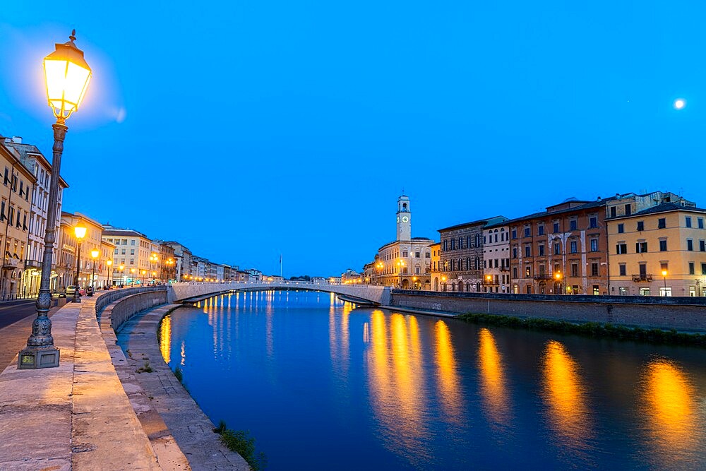 Old lanterns and buildings at dusk with Ponte di Mezzo bridge on banks of Arno river, Lungarno, Pisa, Tuscany, Italy, Europe