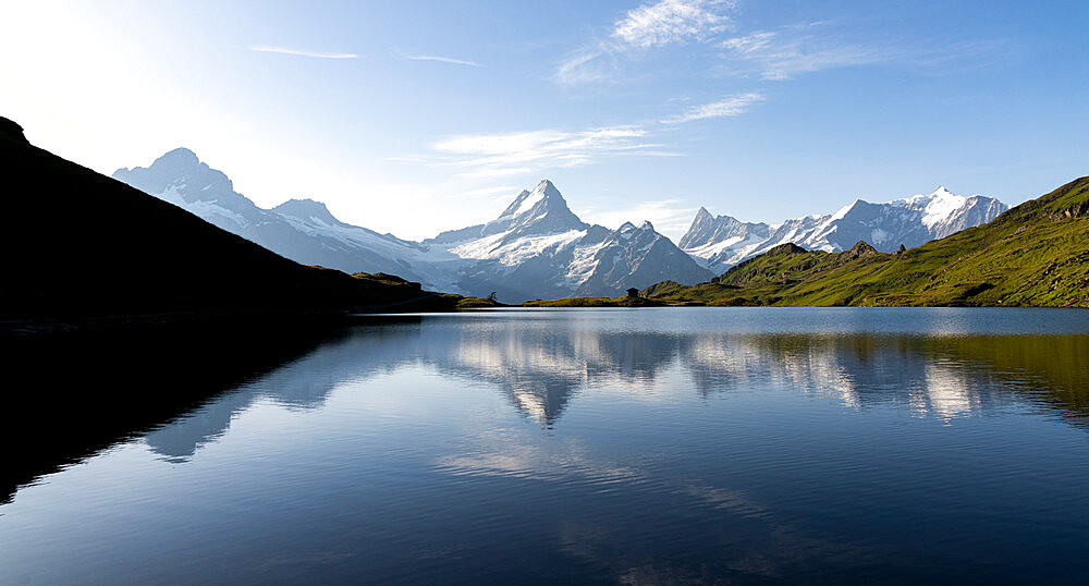 Schreckhorn mountain reflected in Bachalpsee lake at dawn, Grindelwald, Bernese Oberland, Bern Canton, Switzerland, Europe