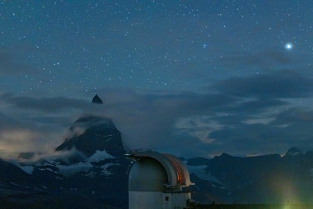 Stars over Matterhorn viewed from the observatory tower of Kulmhotel Gornergrat, Zermatt, canton of Valais, Switzerland, Europe