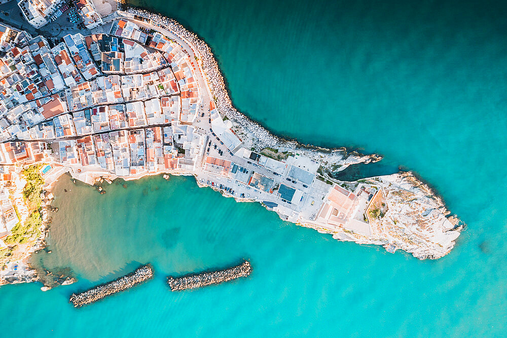 Rooftops of white buildings by the turquoise sea from above, Vieste, Foggia province, Gargano, Apulia, Italy, Europe