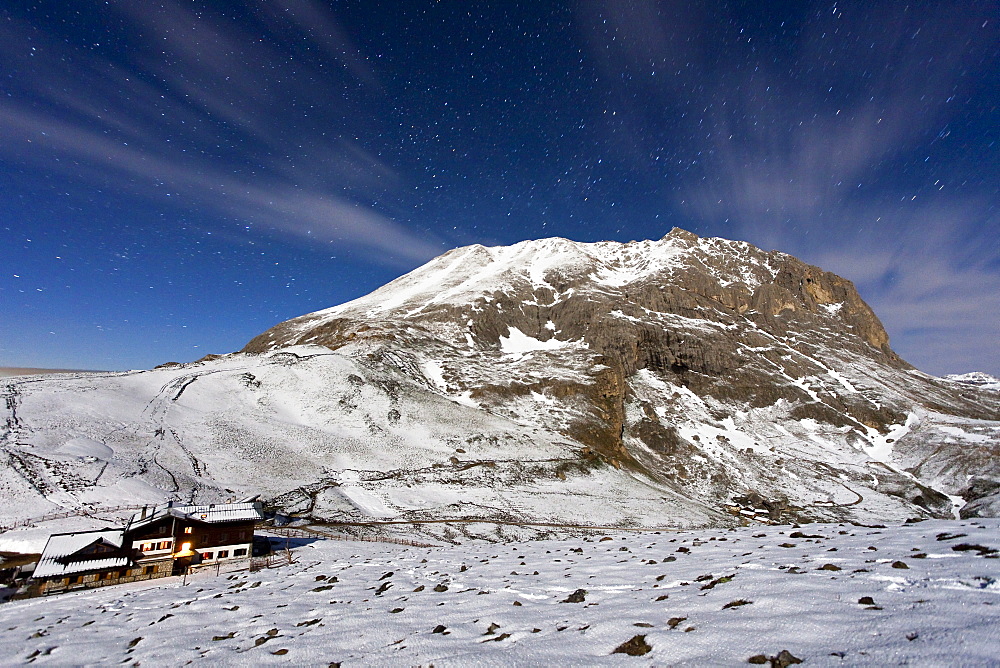 The mountain hut at the foot of Plattkofel (Sasso Piatto) under a starry winter night, South Tyrol, Trentino-Alto Adige, Italy, Europe