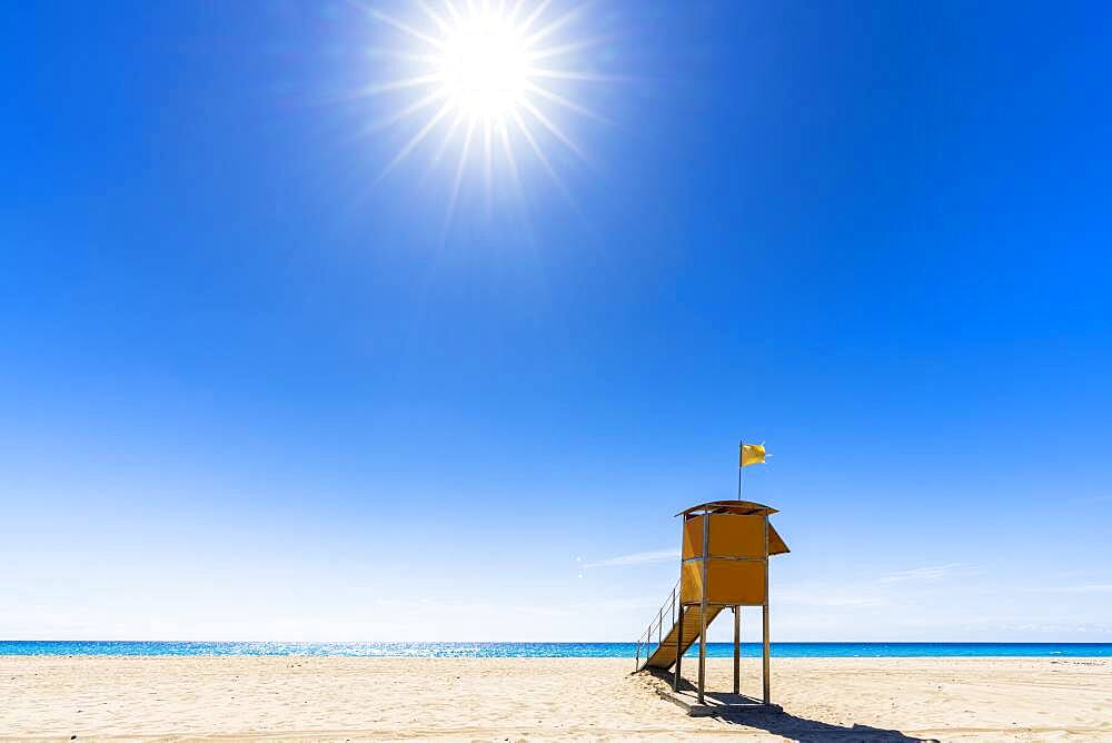 Sun shining over the lifeguard's cabin by the ocean, Morro Jable, Fuerteventura, Canary Islands, Spain, Atlantic, Europe