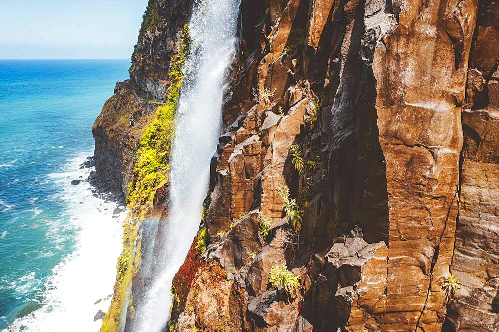 Flowing water of Bridal Veil Fall jumping from rocks, Seixal, Madeira island, Portugal, Atlantic, Europe