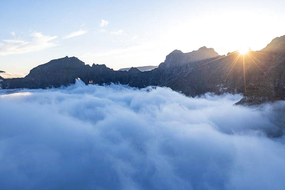 Mountains in a sea of clouds at sunset viewed from Pico Ruivo, Madeira, Portugal, Atlantic, Europe