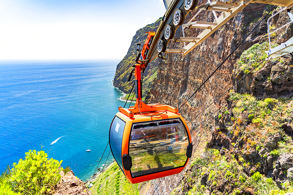 Cable car descending the steep ravine down to the sea, Camara de Lobos, Madeira island, Portugal, Atlantic, Europe