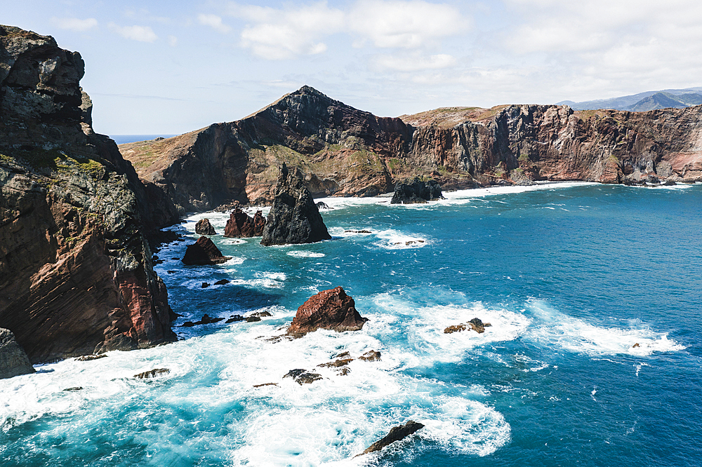 Waves of the Atlantic Ocean crashing on rocky cliffs, Sao Lourenco Peninsula, Canical, Madeira island, Portugal, Europe