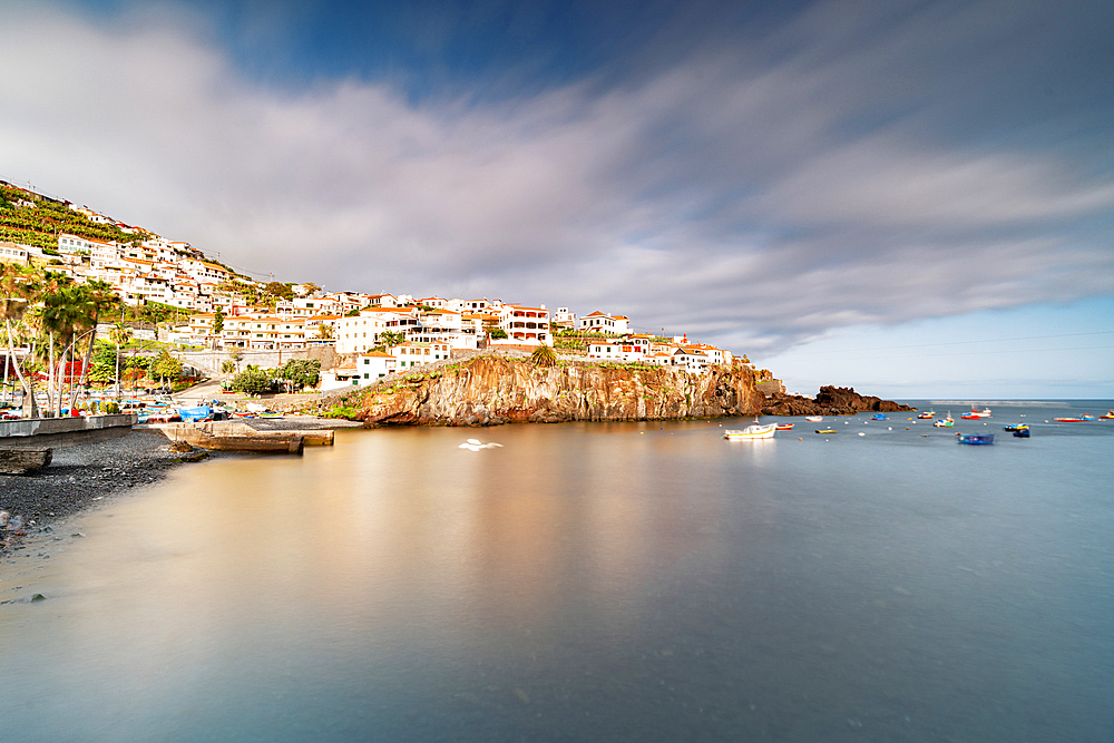 Harbor of the white town Camara de Lobos perched on cliffs, Madeira island, Portugal, Atlantic, Europe