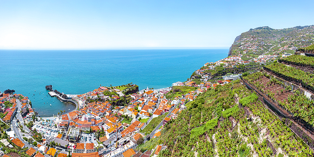 Cultivated terraced fields on hills above the coastal town Camara de Lobos, Madeira island, Portugal, Atlantic, Europe