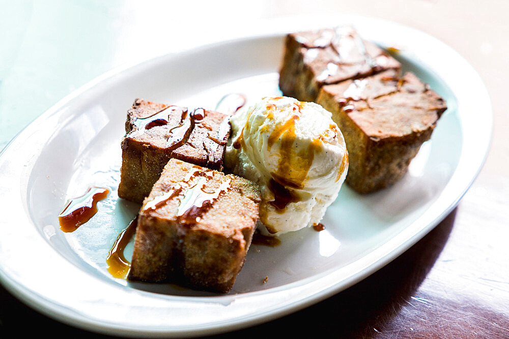 Fried Gofio, flour of roasted and ground cereal, in shape of brownies with ice cream, Fuerteventura, Canary Islands, Spain, Europe