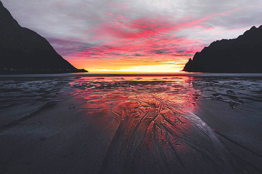 Empty Ersfjord beach against the cloudy sky and midnight sun, Senja island, Troms county, Norway, Scandinavia, Europe