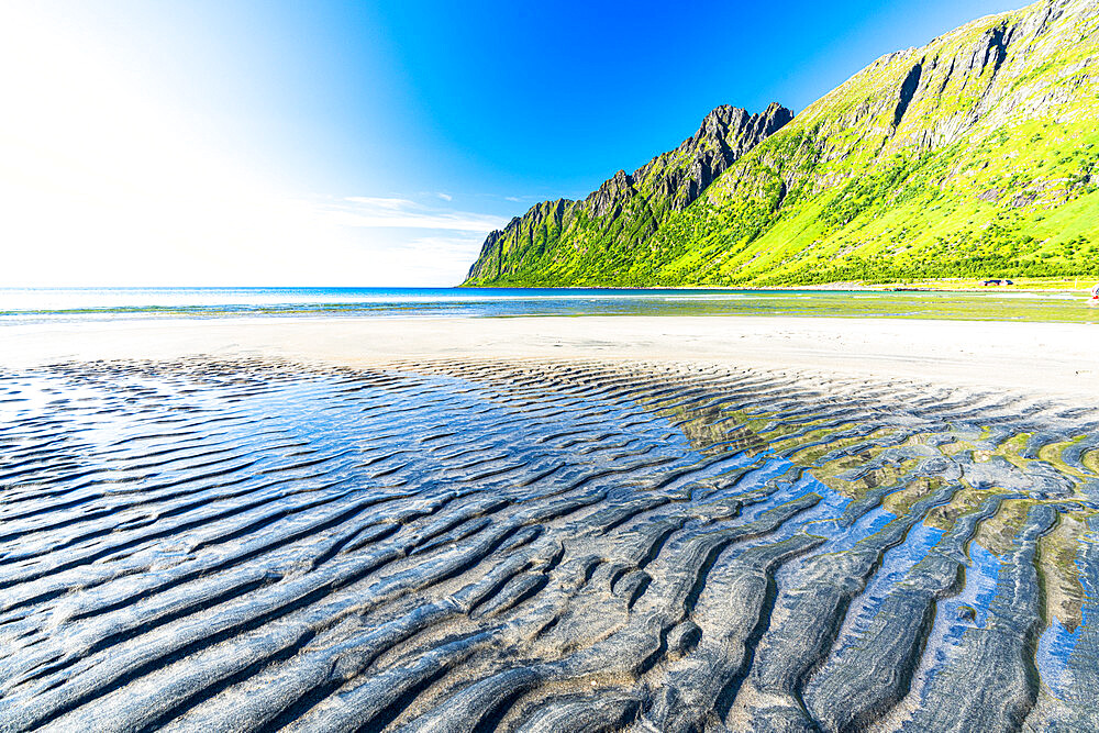 Sand modeled by wind on the empty Ersfjord beach, Senja, Troms county, Norway, Scandinavia, Europe