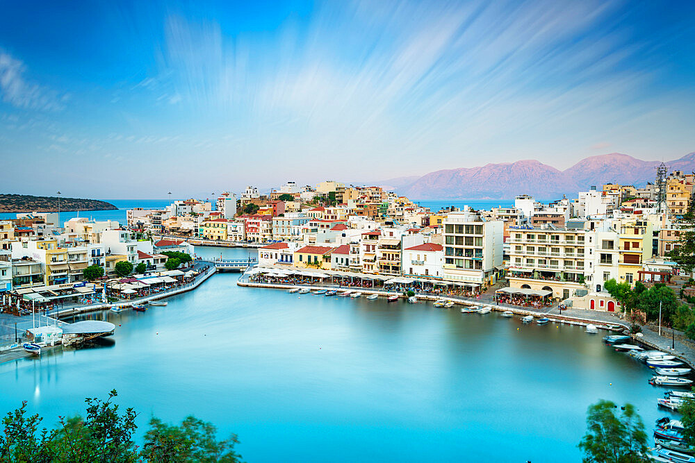 Seaside town resort of Agios Nikolaos by lake Voulismeni, Lasithi prefecture, Crete, Greek Islands, Greece, Europe