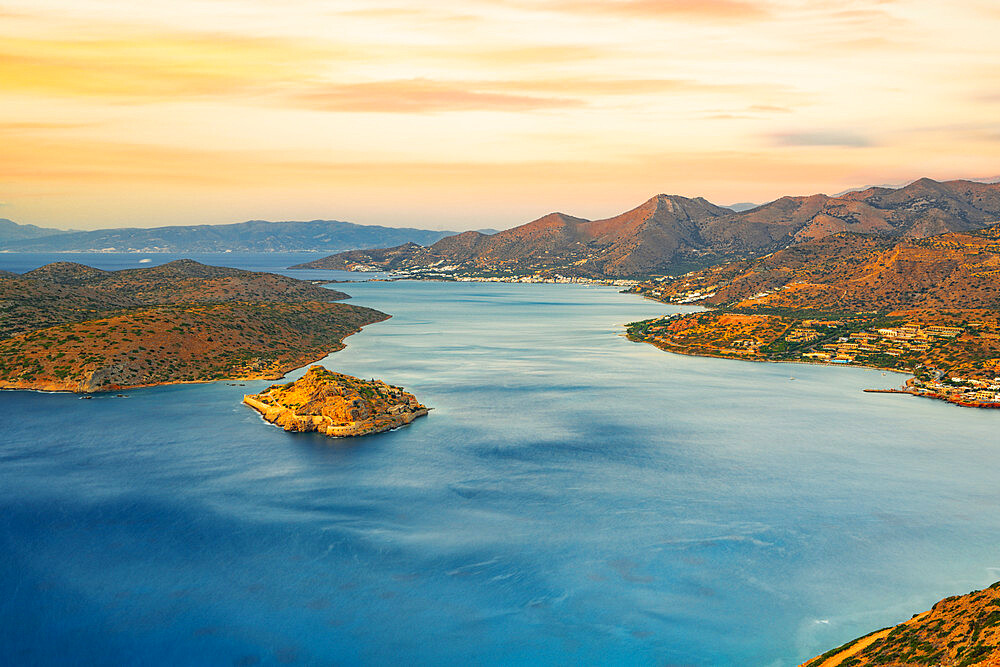 Spinalonga island in the blue sea of Mirabello gulf at sunrise, Plaka, Lasithi prefecture, Crete, Greek Islands, Greece, Europe