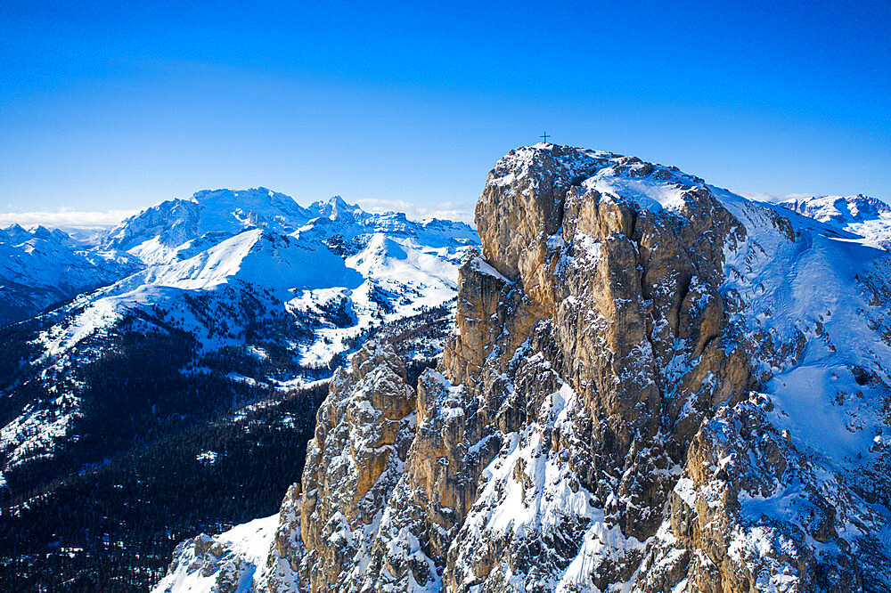 Aerial view of Sass de Stria mountain peak with Marmolada covered with snow in the background, Dolomites, Veneto, Italy, Europe