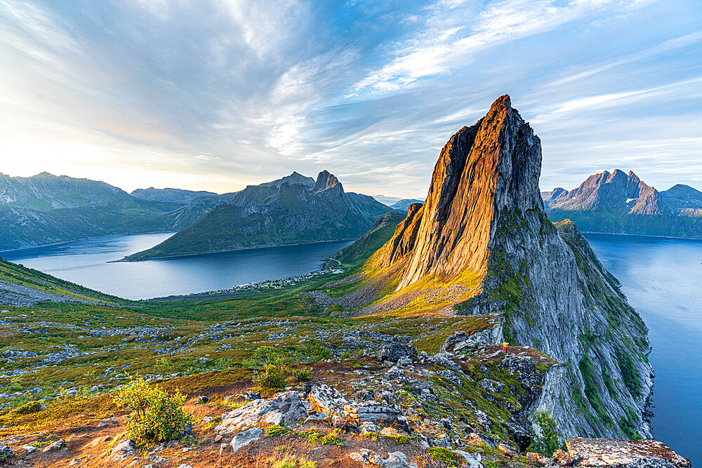 Sunrise over the clear water of the fjord and Segla mountain, Senja island, Troms county, Norway, Scandinavia, Europe