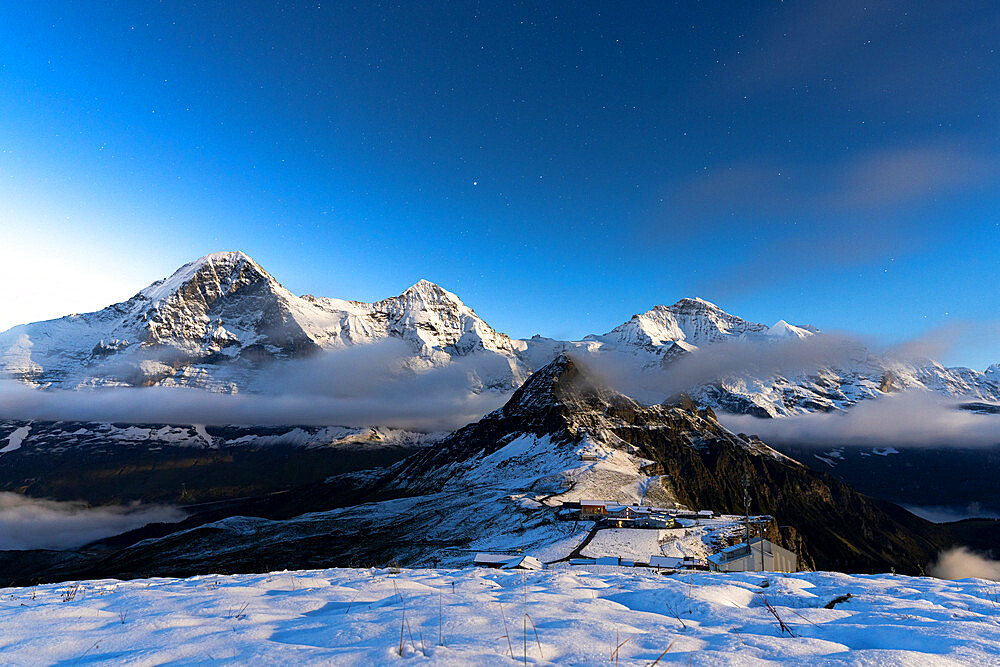 Night view of Eiger, Monch and Jungfrau mountains covered with snow from Mannlichen, Bern Canton, Swiss Alps, Switzerland, Europe