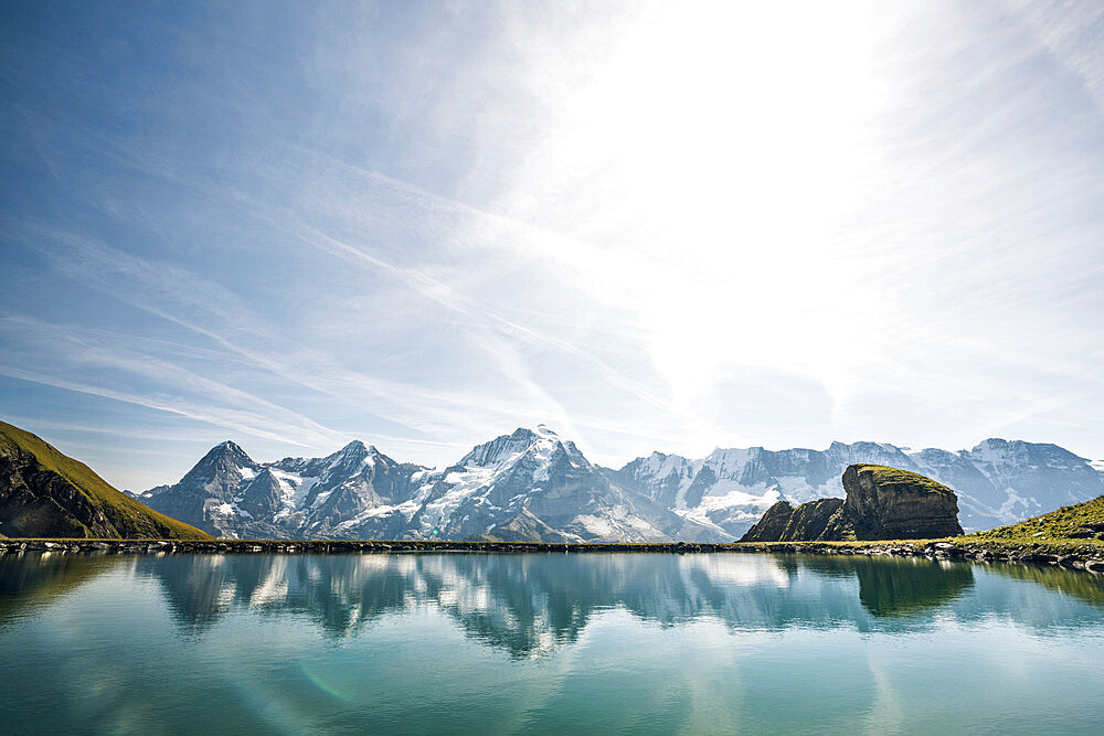 Eiger, Monch and Jungfrau peaks reflected in the unspoiled Engital lake, Murren Birg, Jungfrau Region, Bern Canton, Swiss Alps, Switzerland, Europe