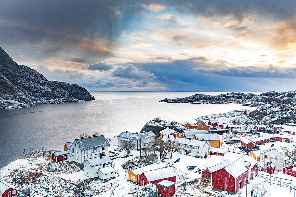 Aerial view of traditional wood houses covered with snow in winter, Nusfjord, Nordland county, Lofoten Islands, Norway, Scandinavia, Europe