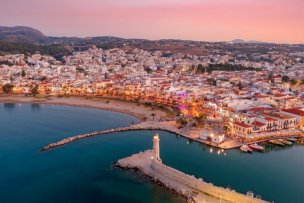 Aerial view of Venetian harbour and lighthouse at sunset, Rethymno, Crete island, Greek Islands, Greece, Europe