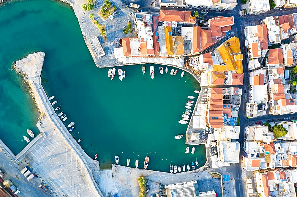 Aerial view of the old town and Venetian harbour overlooking the blue Aegean Sea, Rethymno, Crete island, Greek Islands, Greece, Europe