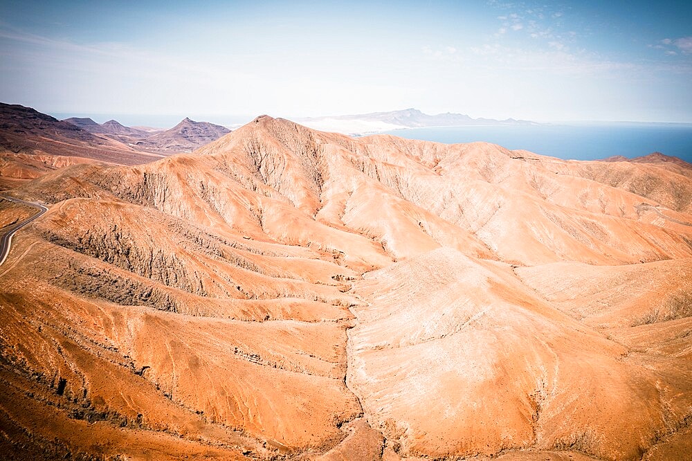 High angle view of barren mountains in the mist from Sicasumbre Astronomical viewpoint, Fuerteventura, Canary Islands, Spain, Atlantic, Europe