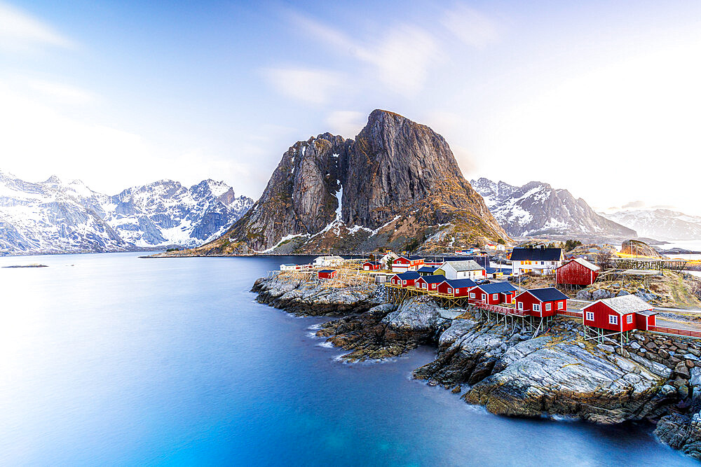 High angle view of traditional red Rorbu cabins in the fishing village of Hamnoy at dawn, Reine, Lofoten Islands, Norway, Europe