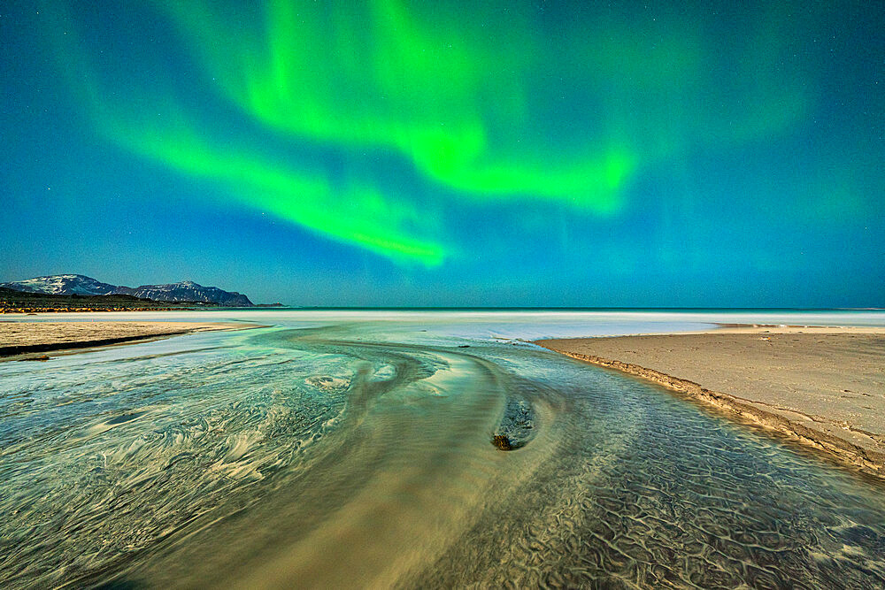 Rippled sand washed by waves during the Aurora Borealis (Northern Lights), Skagsanden beach, Ramberg, Nordland county, Lofoten Islands, Norway, Scandinavia, Europe