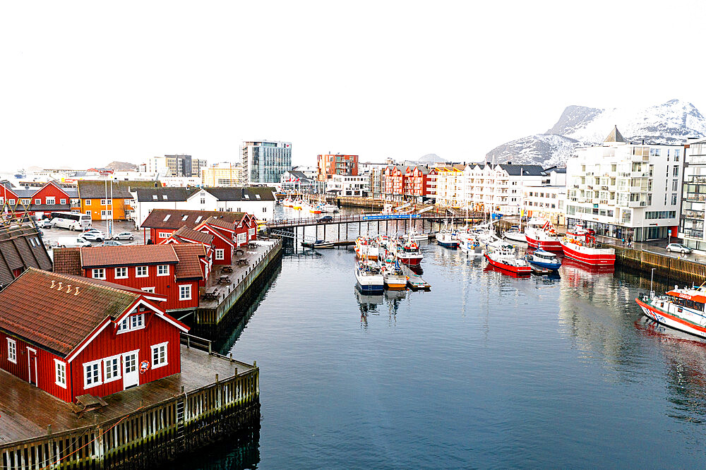 Foggy sky over the fishing village and harbor of Svolvaer, Nordland county, Lofoten Islands, Norway, Scandinavia, Europe