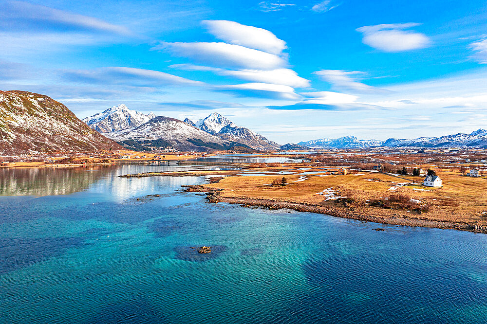 Lone traditional house along the fjord, aerial view, Leknes, Nordland county, Lofoten Islands, Norway, Scandinavia, Europe