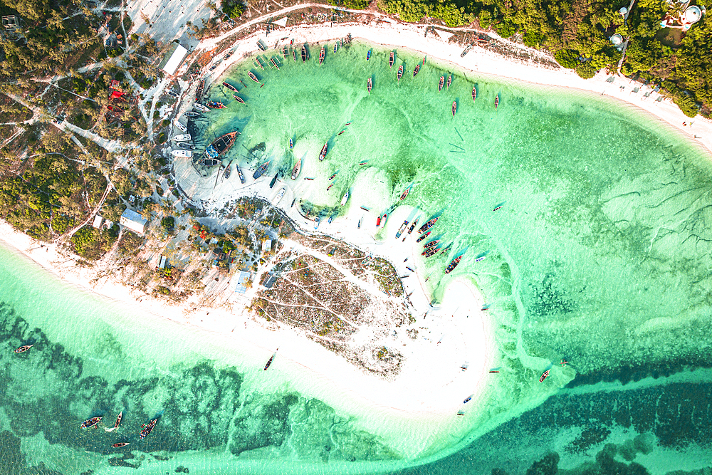 Overhead view of dhow traditional boats moored in a sandy bay overlooking the idyllic Indian Ocean, Kendwa, Zanzibar, Tanzania, East Africa, Africa