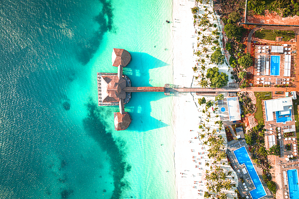 Luxury resort on white coral beach in the clear turquoise water, overhead view, Kendwa, Zanzibar, Tanzania, East Africa, Africa