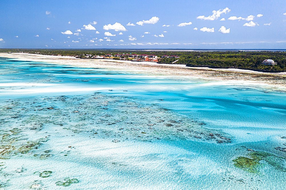 Aerial view of idyllic blue lagoon and nearby white sand beach of Pingwe, Michamvi, Zanzibar, Tanzania, East Africa, Africa