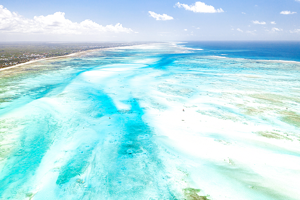 Aerial view of coral reef in the blue lagoon during low tide Paje, Jambiani, Zanzibar, Tanzania, East Africa, Africa