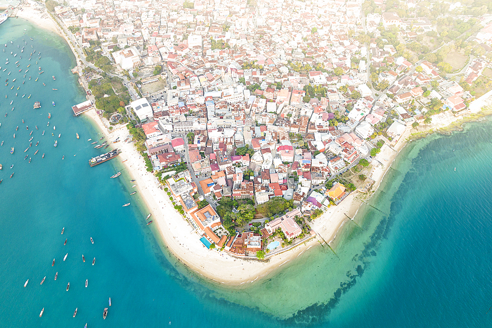 Sunset over Stone Town and waterfront, aerial view, Zanzibar, Tanzania, East Africa, Africa