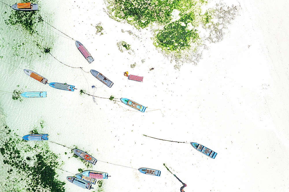 Boats on idyllic white coral beach, overhead view, Zanzibar, Tanzania, East Africa, Africa