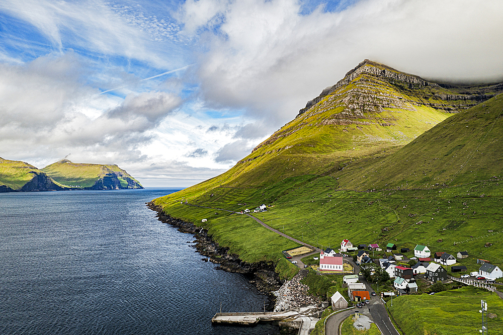 Aerial view of the coastal village of Kunoy and fjord in summer, Kunoy Island, Faroe Islands, Denmark, Europe