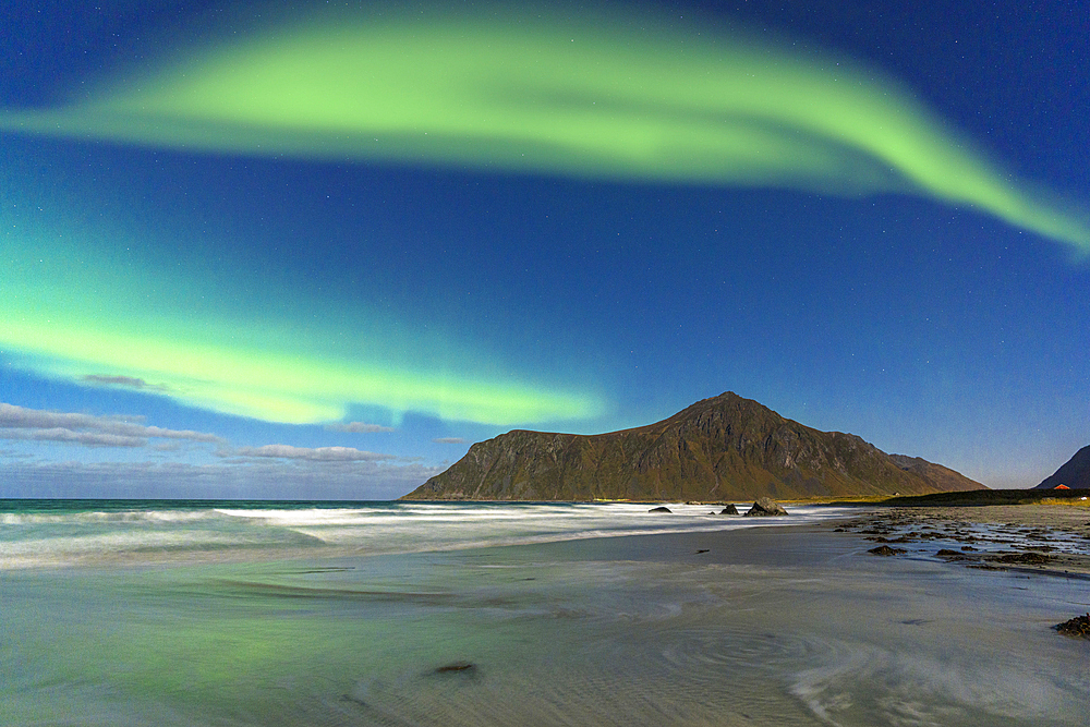 Aurora Borealis (Northern Lights) over the frozen Skagsanden beach, Ramberg, Lofoten Islands, Nordland, Norway, Scandinavia, Europe