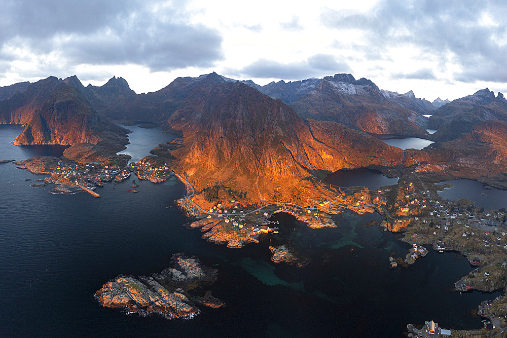 Panoramic aerial view of mountains surrounding the coastal villages of Tind and A i Lofoten, Lofoten Islands, Nordland, Norway, Scandinavia, Europe