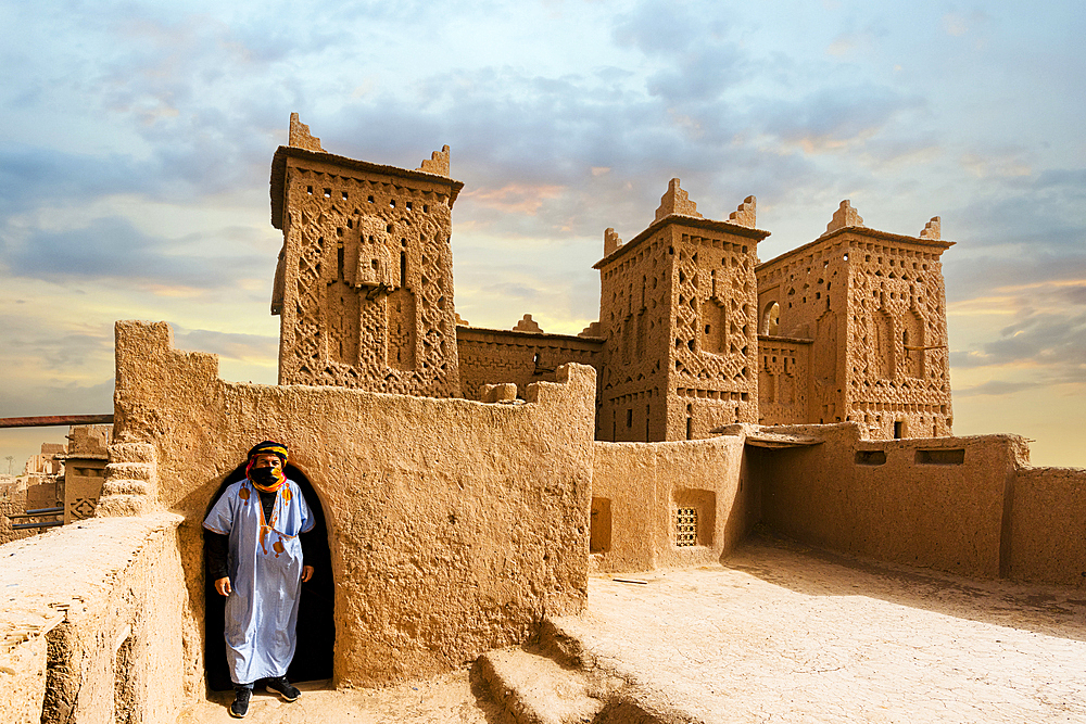 Berber man standing at the historic Kasbah Amridil, Skoura, Atlas mountains, Ouarzazate province, Morocco, North Africa, Africa