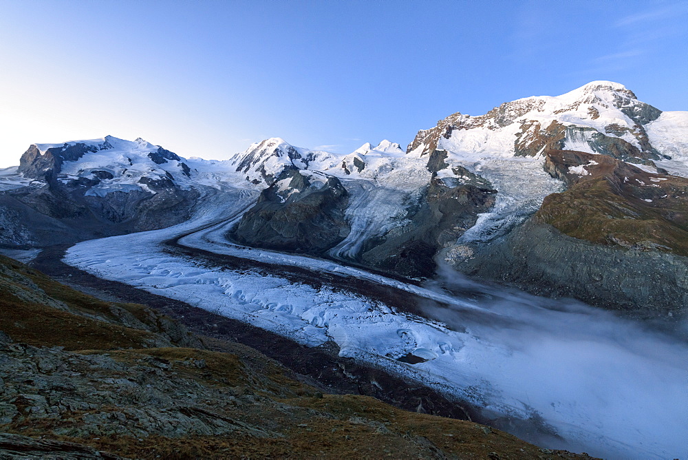 View of Mont Rosa Massif and its glacier at dusk, Zermatt, Canton of Valais, Pennine Alps, Swiss Alps, Switzerland, Europe