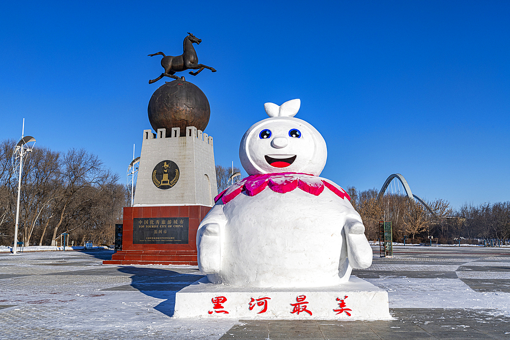 Huge snow man on the Amur river banks, Heihe, Heilongjiang, China, Asia