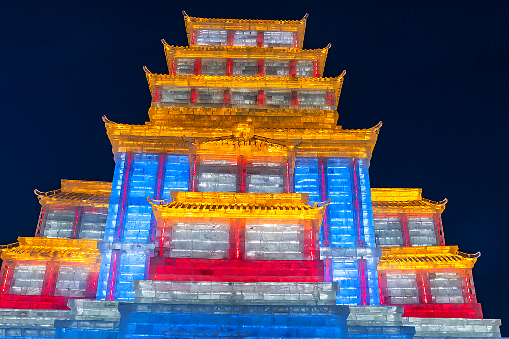 Illuminated buildings made out of ice, Ice International Ice and Snow Sculpture Festival, Harbin, Heilongjiang, China, Asia