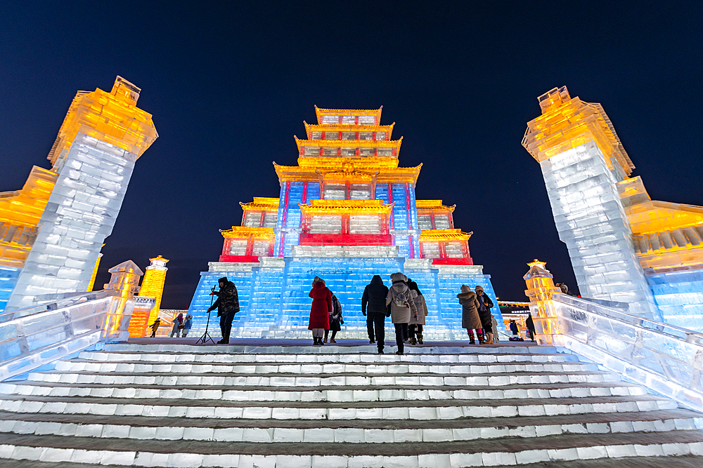 Illuminated buildings made out of ice, Ice International Ice and Snow Sculpture Festival, Harbin, Heilongjiang, China, Asia