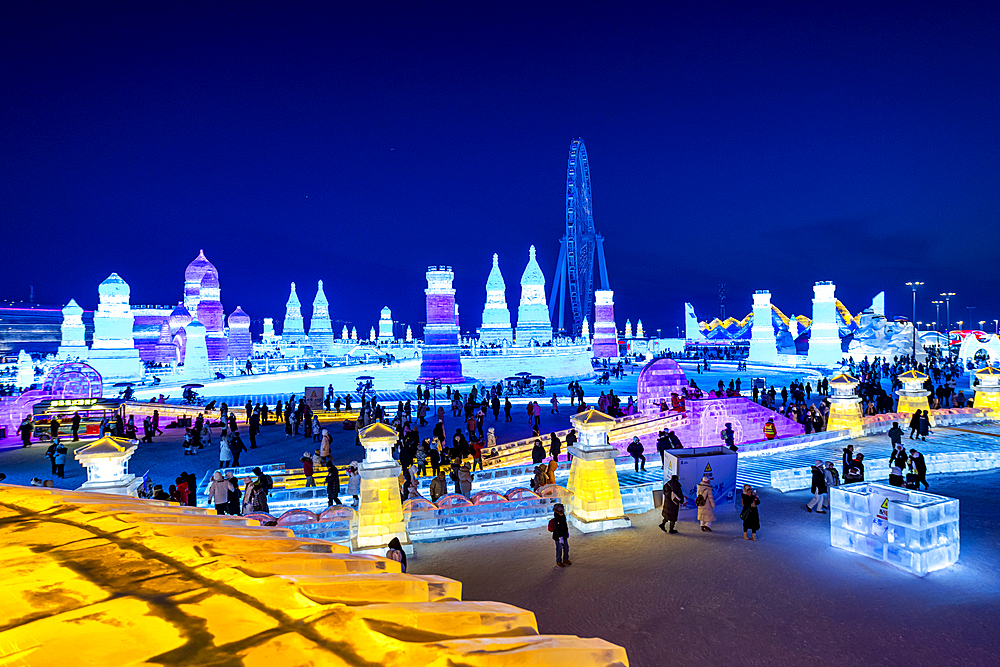 Illuminated buildings made out of ice, Ice International Ice and Snow Sculpture Festival, Harbin, Heilongjiang, China, Asia