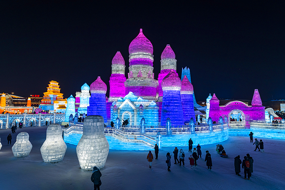 Illuminated buildings made out of ice, Ice International Ice and Snow Sculpture Festival, Harbin, Heilongjiang, China, Asia