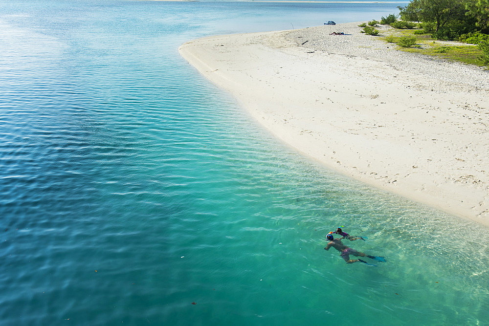 Man snorkeling in the beautiful lagoon of Ouvea, Loyalty Islands, New Caledonia, Pacific