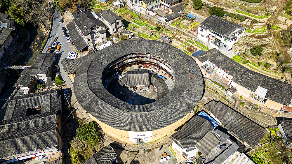 Aerial of Taxia village and Fujian Tulou, rural dwelling of the Hakka, Fujian, China, Asia