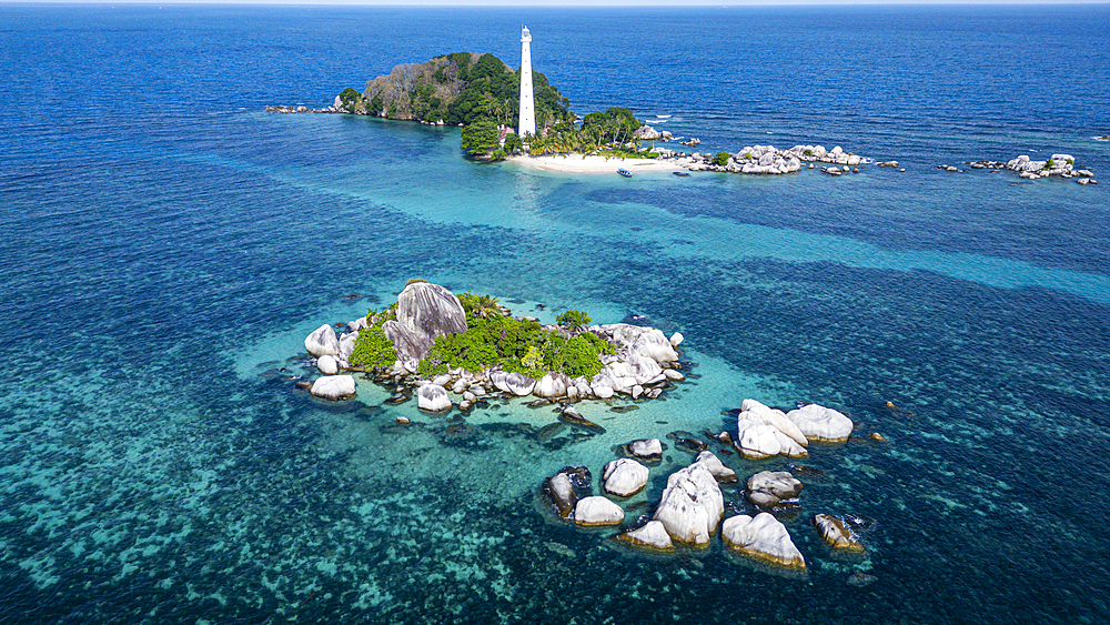 Aerial of Old Indie Lighthouse, Lengkuas Island, Belitung island off the coast of Sumatra, Indonesia, Southeast Asia, Asia