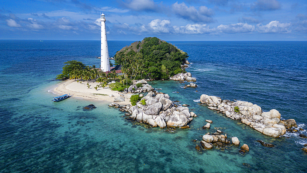 Aerial of Old Indie Lighthouse, Lengkuas Island, Belitung island off the coast of Sumatra, Indonesia, Southeast Asia, Asia