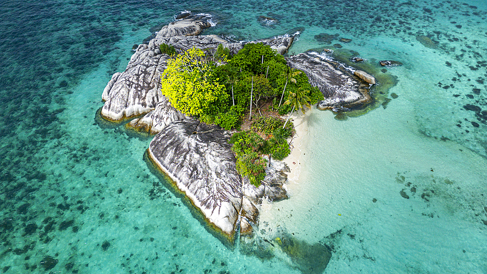 Aerial of a little islet off the coast of Belitung island off the coast of Sumatra, Indonesia, Southeast Asia, Asia